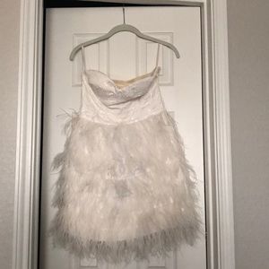 Sequin and feather white party dress